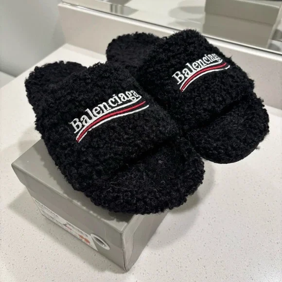 Balenciaga | Shoes | Balenciaga Black Textured Slides | Poshmark display picture 1